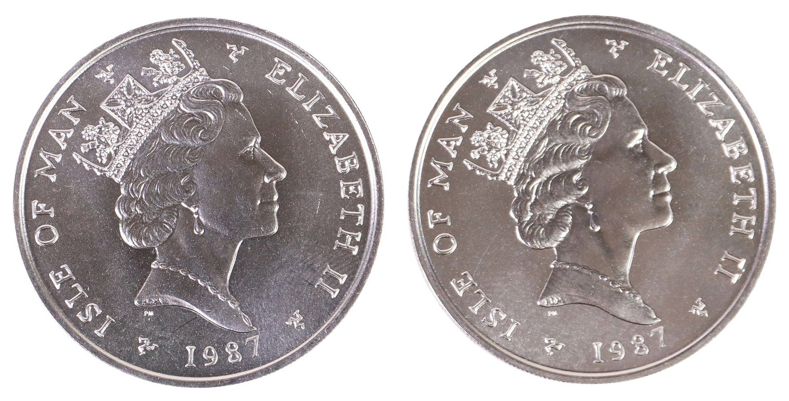 (2) PLATINUM, 1 OUNCE FINE ONE NOBLE COINS, ISLE OF MAN, 1987: (lot of 2) U.K. Isle of Man One Noble, 1987, 1oz Platinum Fine Coins, appearing as BU, a likeness of Queen Elizabeth on the obverse, a Viking ship on the reverse **Provenance: the contents of a luxury