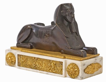 EGYPTIAN REVIVAL ORMOLU & PATINATED BRONZE MODEL OF A SPHINX