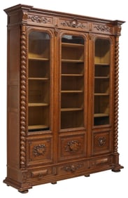 FRENCH HENRI II STYLE CARVED OAK GLAZED BOOKCASE