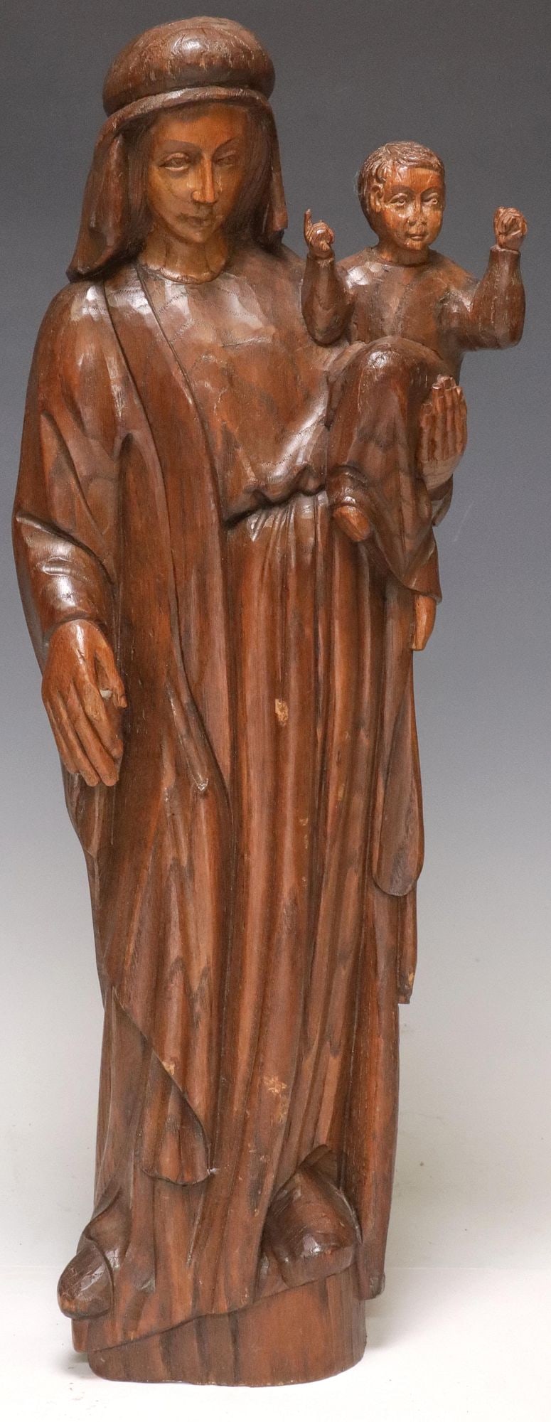 CONTINENTAL CARVED OAK RELIGIOUS FIGURE, MADONNA & CHILD, 23.75"H: Continental carved oak religious figure, Madonna and Child, rising on integral platform, approx 23.75"h, 8.75"w, 4"d, 6.25lbs