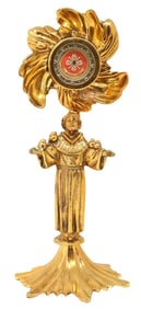 1ST-CLASS RELIC OF ST. JOHN BERCHMANS IN FIGURAL ST. FRANCIS RELIQUARY STATUETTE