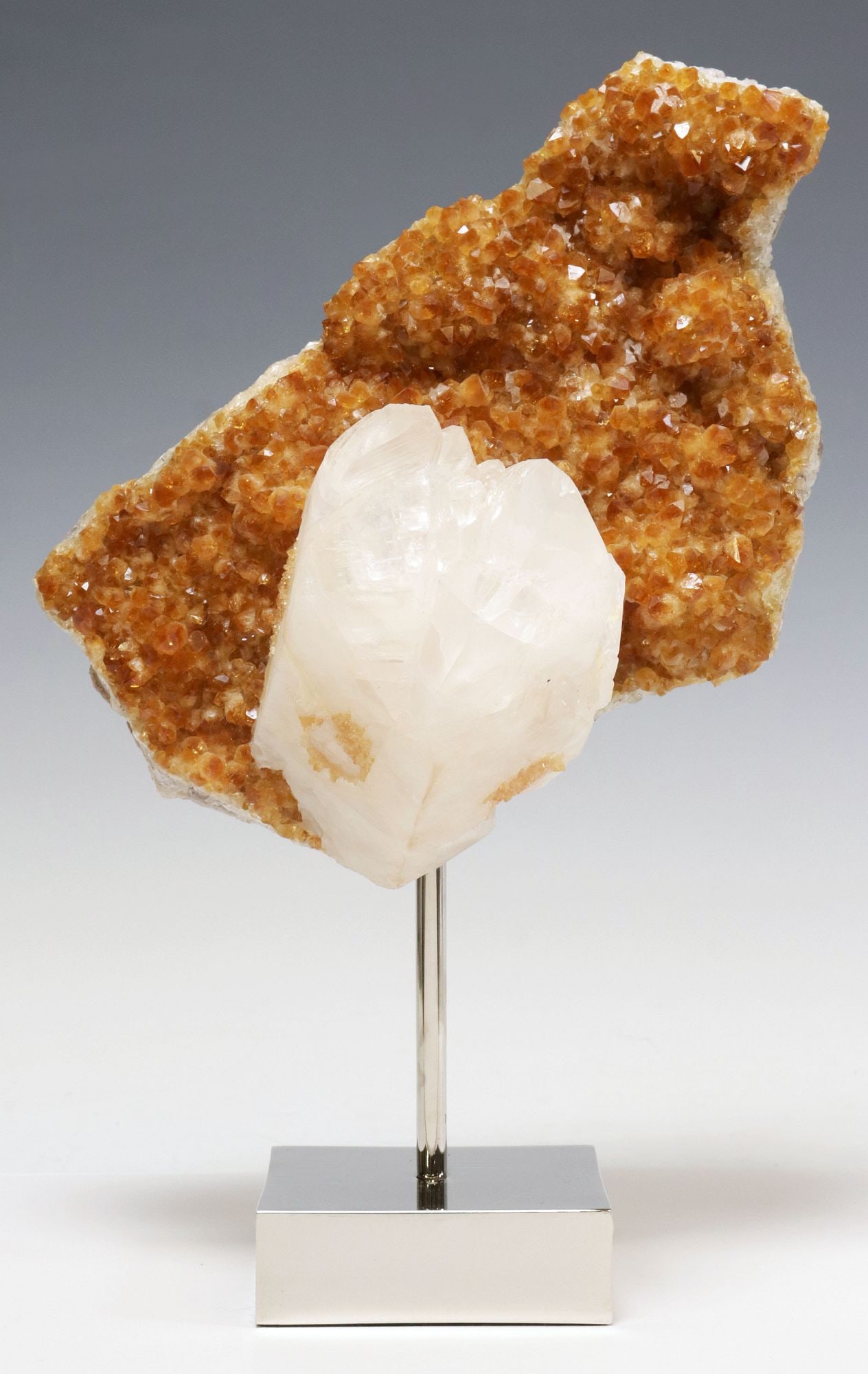 GEOLOGICAL ORANGE CRYSTAL CLUSTER ON POLISHED NICKEL BASE (1 of 3)