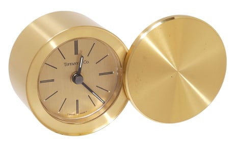 TIFFANY & CO. SWISS SWIVEL LID GILT-METAL ALARM CLOCK