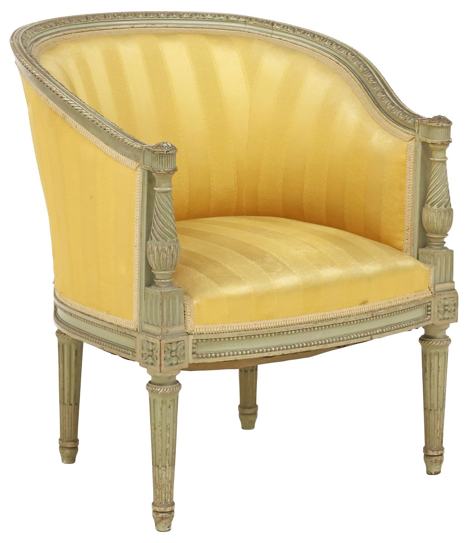 FRENCH LOUIS XVI STYLE UPHOLSTERED & PAINTED BERGERE / ARMCHAIR: French Louis XVI style paint-decorated bergere/ armchair, late 19th c., having padded back and seat in a worn striped fabric upholstery, rising on fluted tapering legs, ending on blunt arrow feet, app