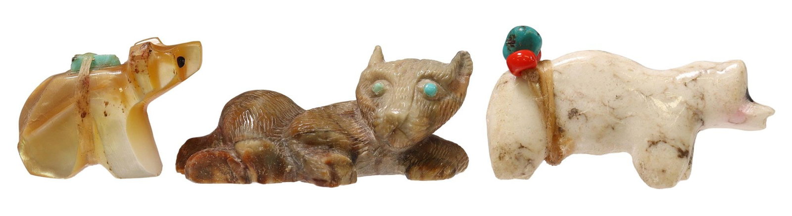 (3) CARVED STONE FETISHES, FABIAN CHEAMA & OTHERS: (lot of 3) Native American and other carved figural fetishes, comprising: (one) carved stone mountain lion, Fabian Cheama (Zuni, New Mexico), having turquoise inset eyes, marked underneath, approx: 1.