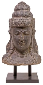 LARGE SOUTHEAST ASIAN CARVED STONE HEAD, FEMALE DEITY