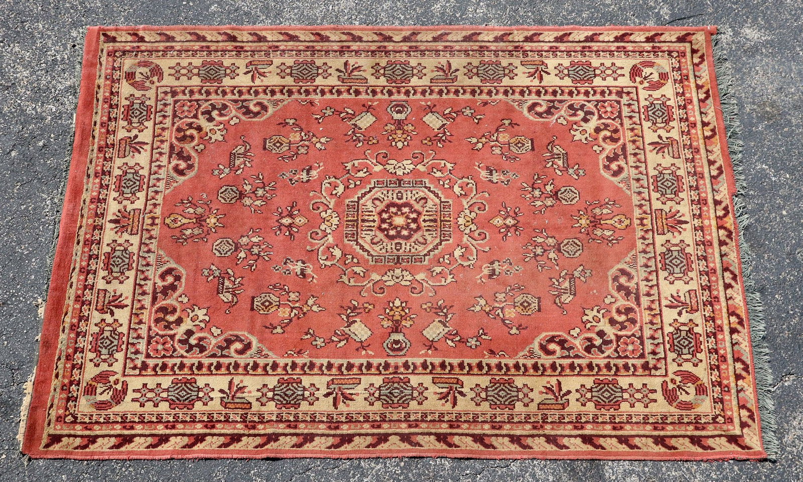 ESTATE HAND-TIED RUG, 6'2" X 4'4": Estate hand-tied rug, intact with 0.5"-1" of surface loss at one end of fringe, fringe separation, approx 6'2"l, 4'4"w **Please Note: All of the rugs offered in this auction would likely benefit from 