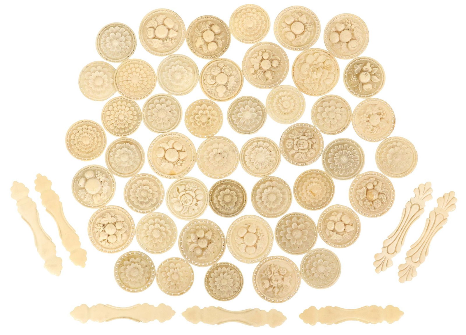 (53) FRENCH CARVED BONE SEWING ACCESSORIES, PINCUSHION COVERS & THREAD WINDERS: (lot of 53) French carved bone and ivory sewing accessories, late 19th c., including: (46) pincushion covers, each having pierced border, slightly varied sizes, (twenty-seven) having central floral me
