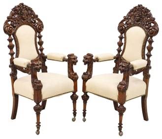 (2) AMERICAN VICTORIAN RENAISSANCE REVIVAL CARVED OAK ARMCHAIRS
