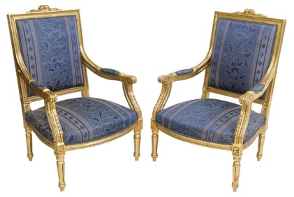 (2) LOUIS XVI STYLE UPHOLSTERED GILTWOOD ARMCHAIRS / FAUTEUILS