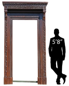 ITALIAN PROFUSELY CARVED WALNUT ARCHITECTURAL DOOR SURROUND
