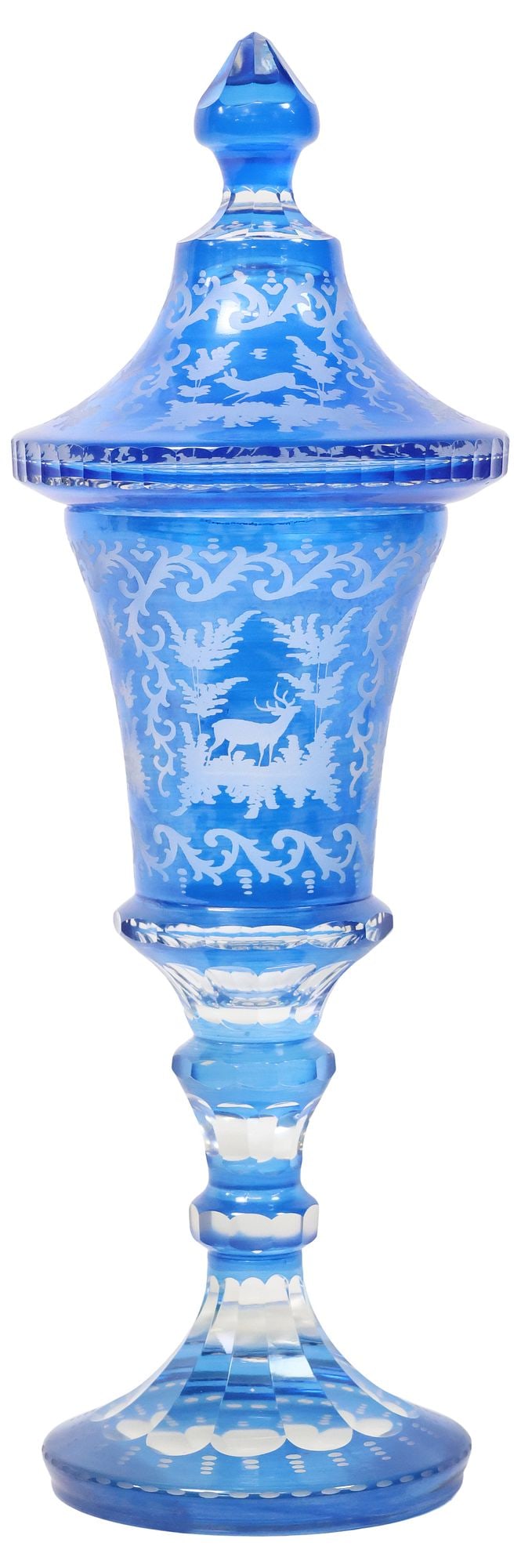 BOHEMIAN BLUE CUT-TO-CLEAR GLASS POKAL OR COVERED VASE, 18.5"H: Bohemian blue cut-to-clear glass pokal or covered vase, late 19th c., having pointed finial, above tapering body with etched foliate scrollwork, depicting forest landscape with pheasants and stags, ri
