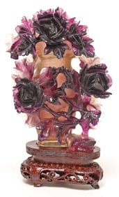 CHINESE CARVED AMETHYST COVERED VASE ON STAND