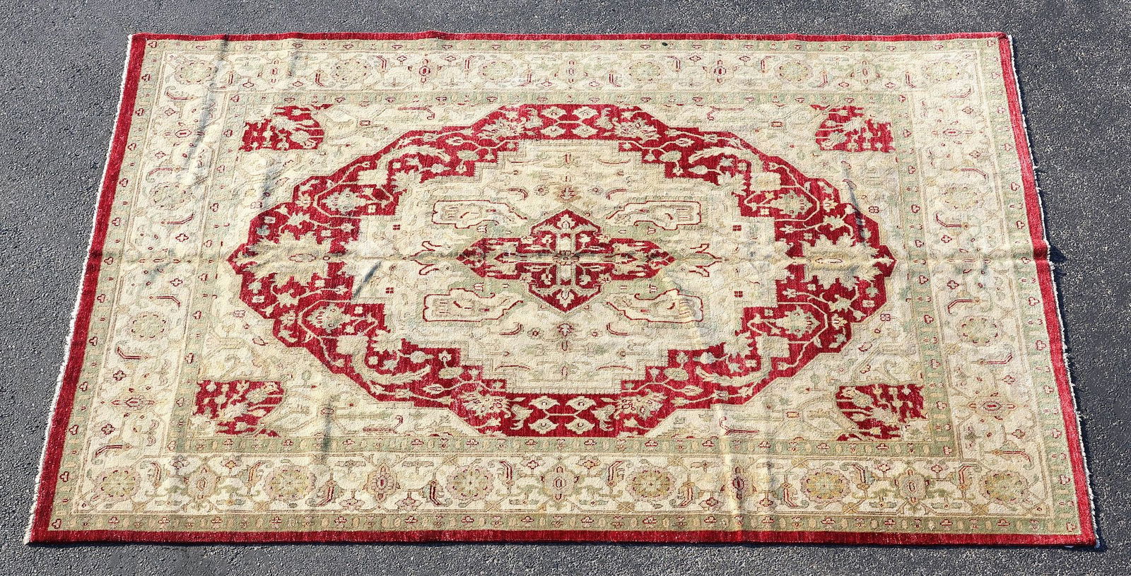 ESTATE HAND-TIED PAKISTANI WOOL OUSHAK RUG, 9'11" X 7'10": Estate hand-tied wool Oushak rug, Pakistan, approx 9'11"l, 7'10"w **Please Note: All of the rugs offered in this auction would likely benefit from a professional cleaning. Estate rugs may show some we