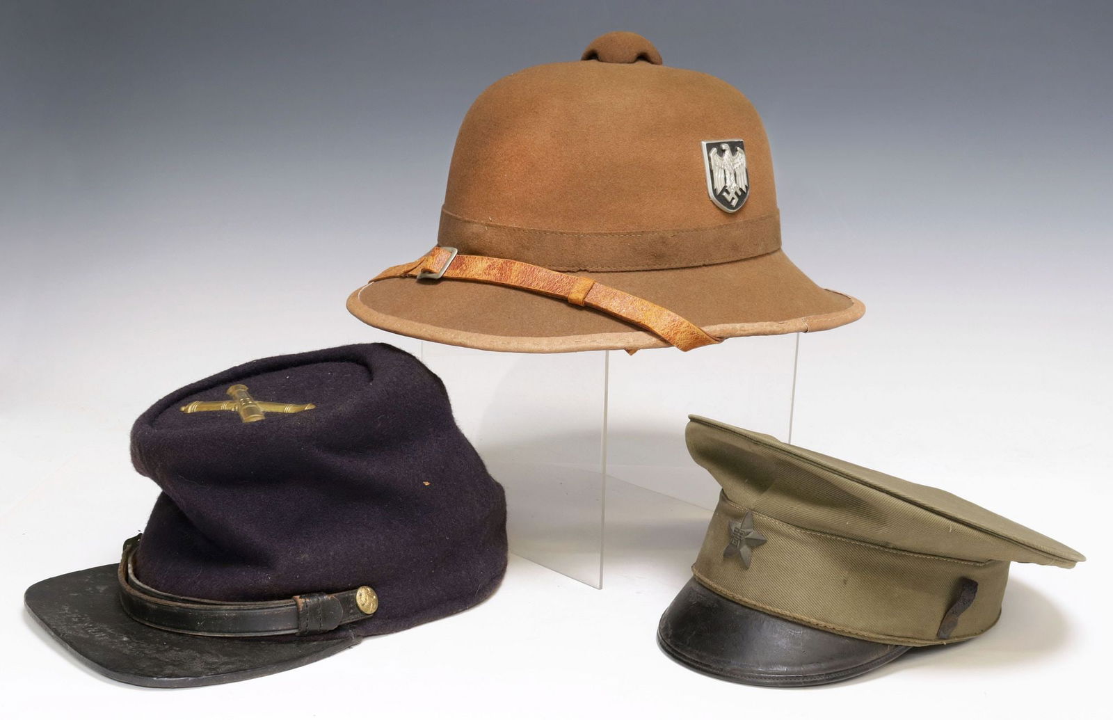 (3) MILITARY HATS, GERMAN WWII PITH, U.S. 19TH C., JAPAN WWII: (lot of 3) Military Hats: (1) WWII German Pith / Tropical helmet, Afrika Korps, at left side the Army shield depicting an eagle holding a swastika, at the right side a shield with the German national
