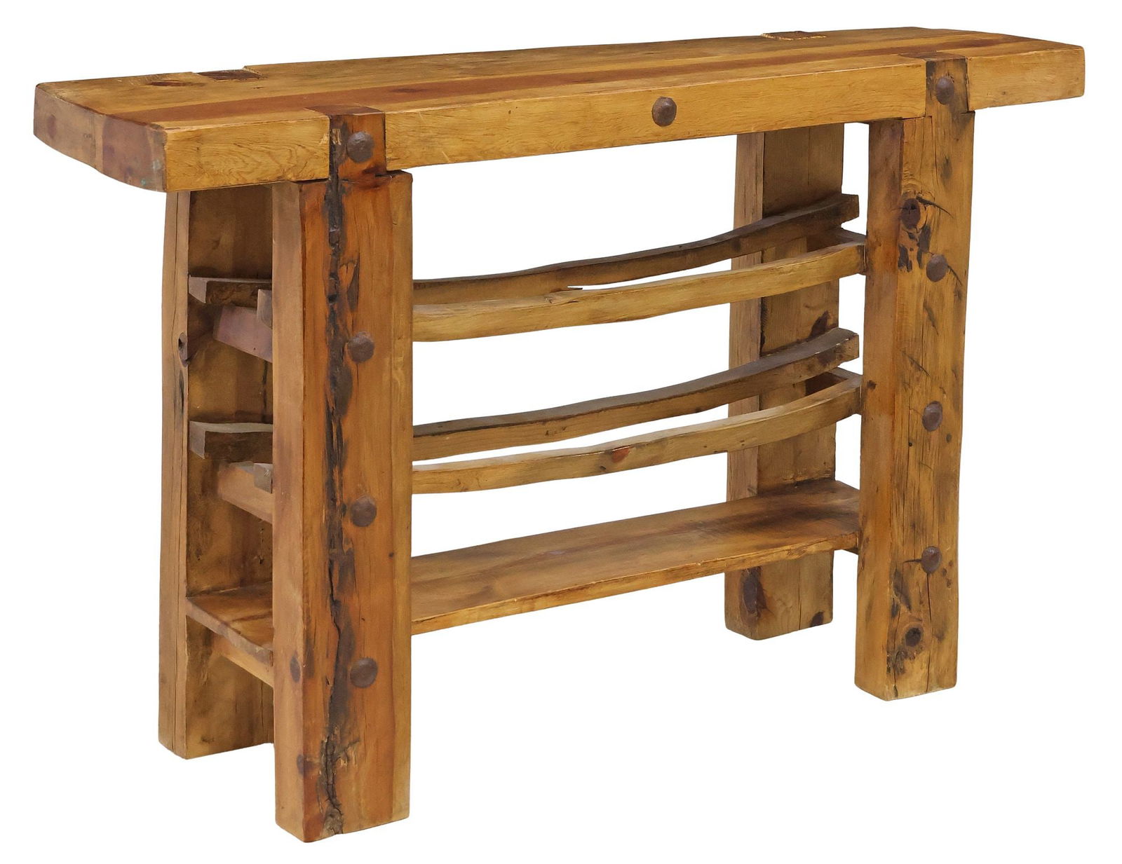 RUSTIC SLAB-TOP PINE CRAFTSMAN'S WORKBENCH CONSOLE TABLE: Rustic pine craftsman's workbench or console table, having 3" thick slab top, over two open double-slatted shelves and solid plank shelf, all joining squared legs, with large oxidized metal stud accen