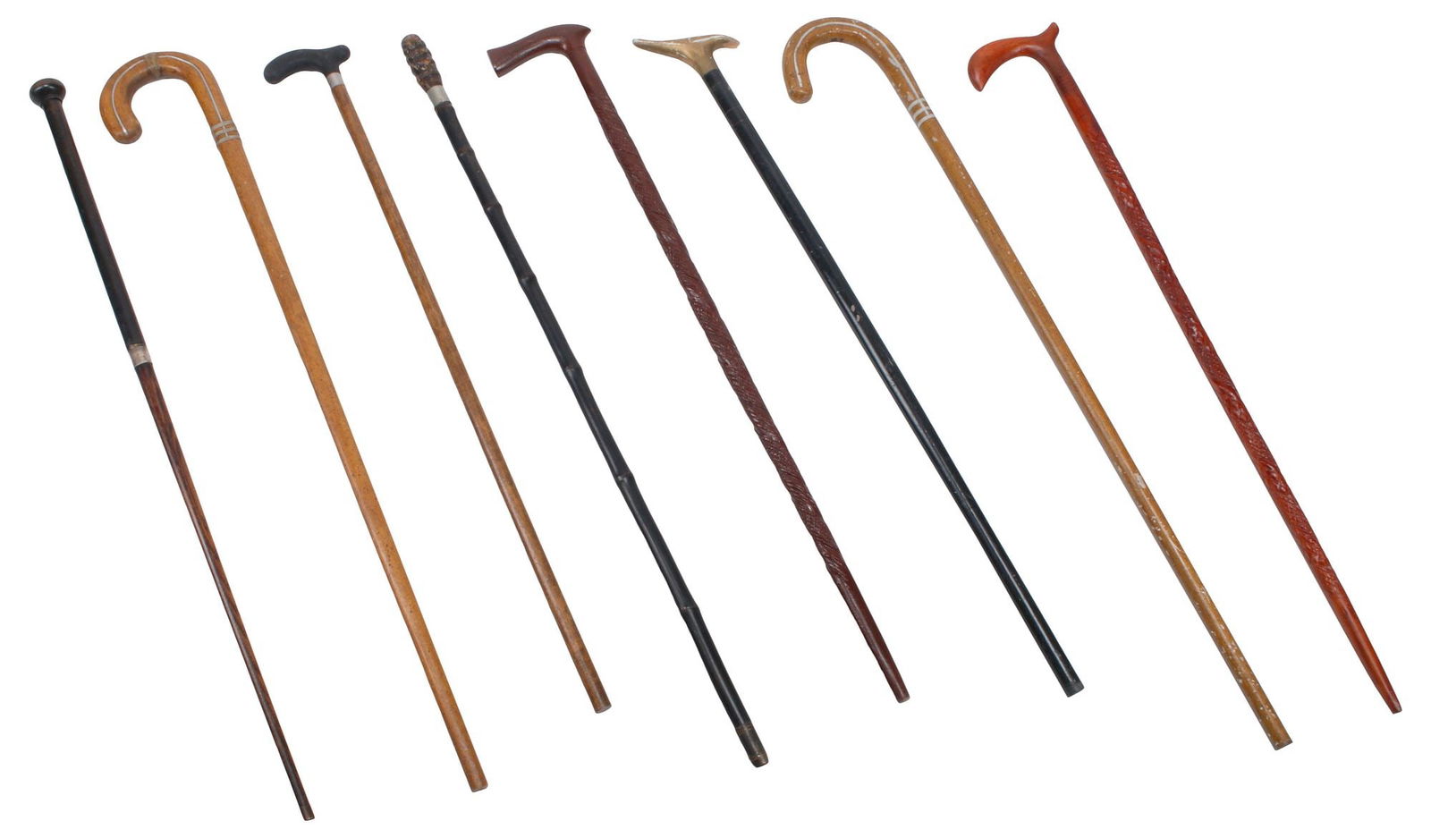 (8) COLLECTION OF VARIED CANES / WALKING STICKS: (lot of 8) Collection of canes or walking sticks, varied styles, one intact with restoration to top handle, largest: 38"l, 1"w, 5.5"d