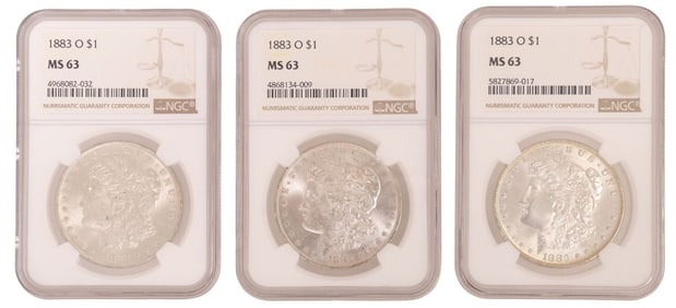 (3) U.S. MORGAN 1883-O SILVER DOLLARS, NGC MS-63