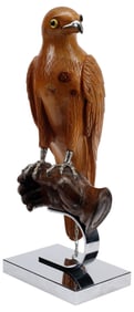 CARVED WOOD FALCON PERCHED ON GLOVED HAND WITH CHROMED STAND