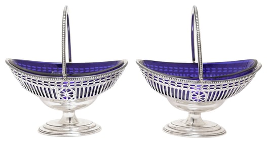 (2) EDWARDIAN STERLING SILVER SUGAR BASKETS WITH BLUE GLASS LINERS