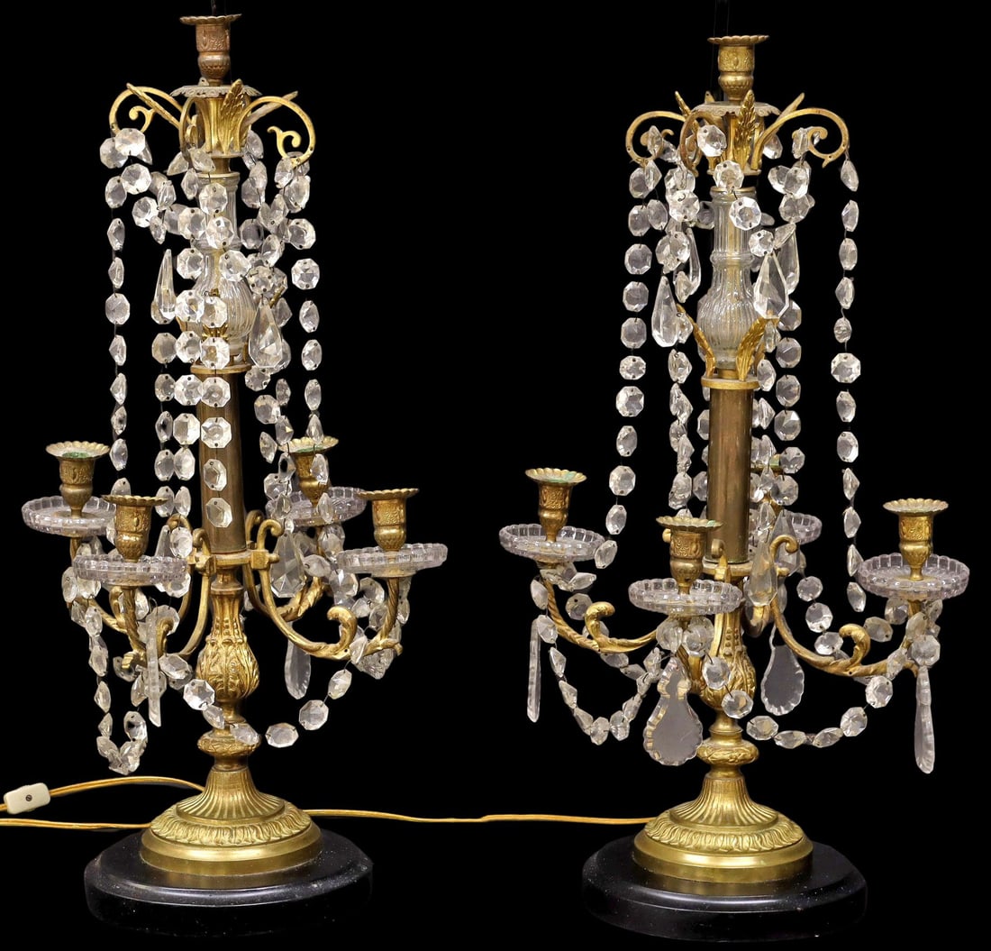 (2) LARGE FRENCH ORMOLU & CRYSTAL GIRANDOLE 1-LIGHT TABLE LAMPS, 39"H: (pair) Large French bronze dore and crystal five-light girandoles, early 20th c., now fashioned as single-light table lamps, each having turned-form standard with glass-clad top, issuing four scrolled