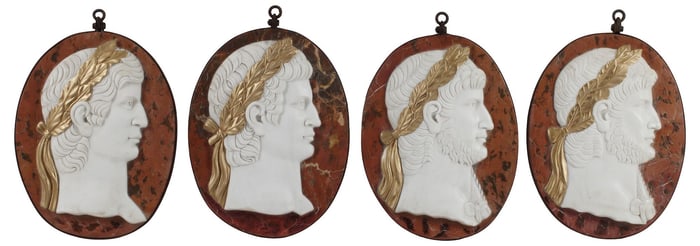 (4) MARBLE RELIEF PLAQUES OF ROMAN EMPERORS IN IRON MOUNTS