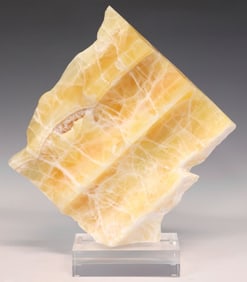 LARGE GEOLOGICAL HONEYCOMB CALCITE SPECIMEN ON ACRYLIC BASE