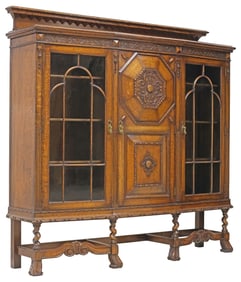JACOBEAN REVIVAL CARVED OAK BOOKCASE