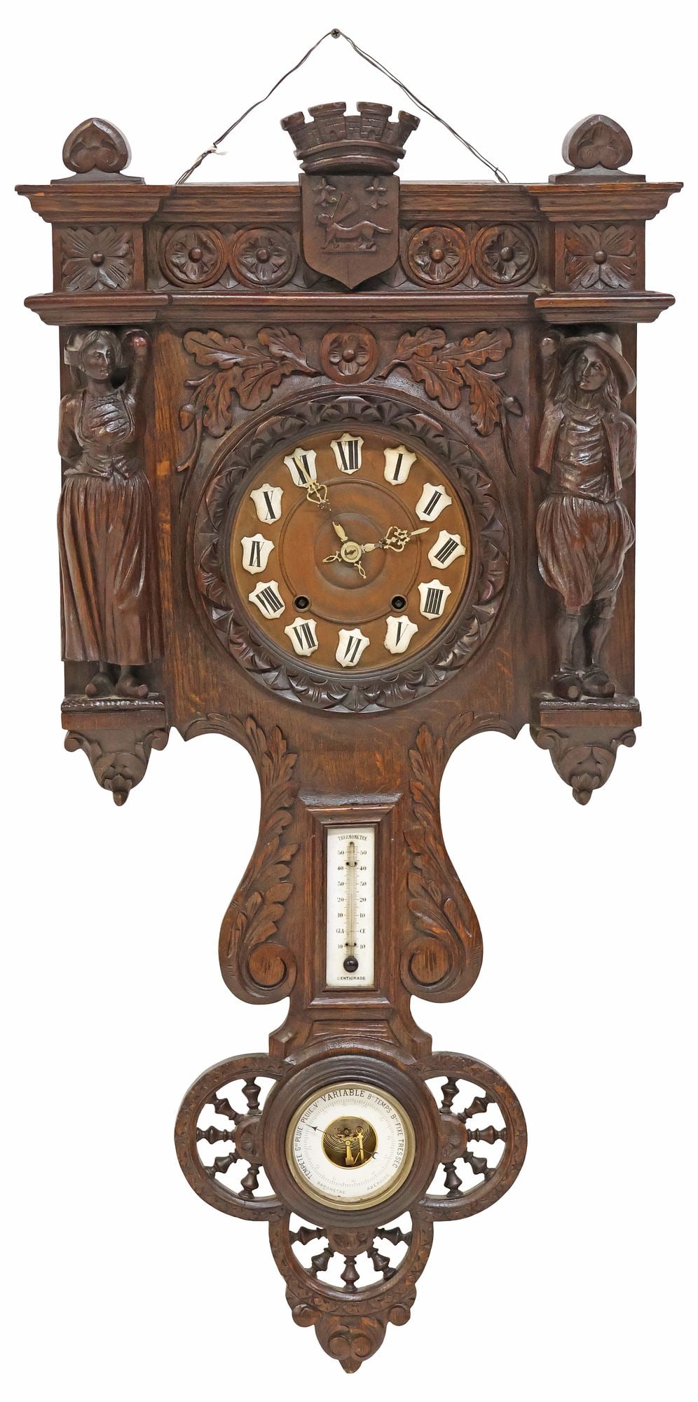 FRENCH CARVED OAK WALL CLOCK WITH BAROMETER & THERMOMETER: French carved oak wall clock, late 19th c., having crown and shield crest, above floral medallions and protruding full figures, flanking dial with porcelain Roman numeral hour markers, time-and-strike