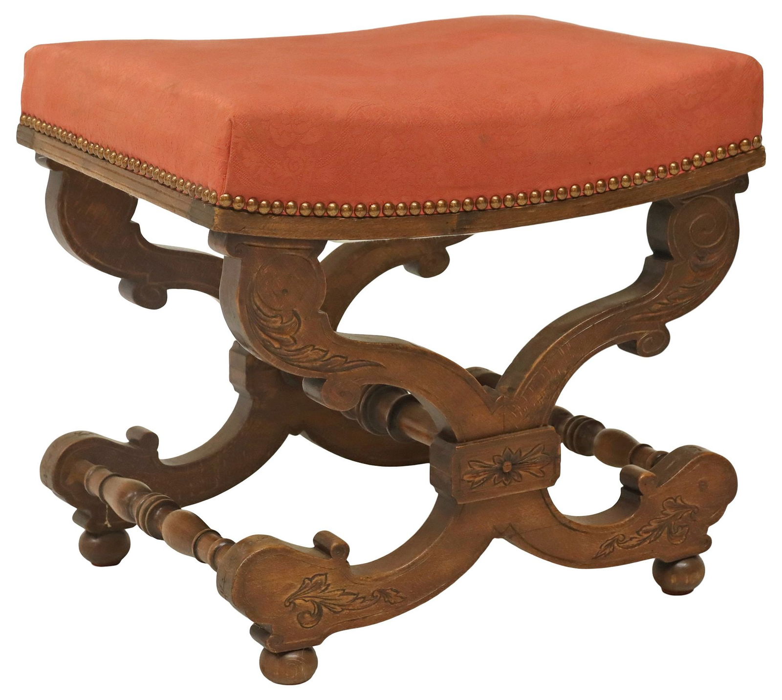 VICTORIAN EASTLAKE CARVED OAK UPHOLSTERED STOOL / OTTOMAN: Victorian Eastlake carved oak ottoman/ footstool, having padded top in patterned fabric upholstery, with nailhead trim, rising on scrolled trestle base, joined by turned stretcher, ending on bun feet,