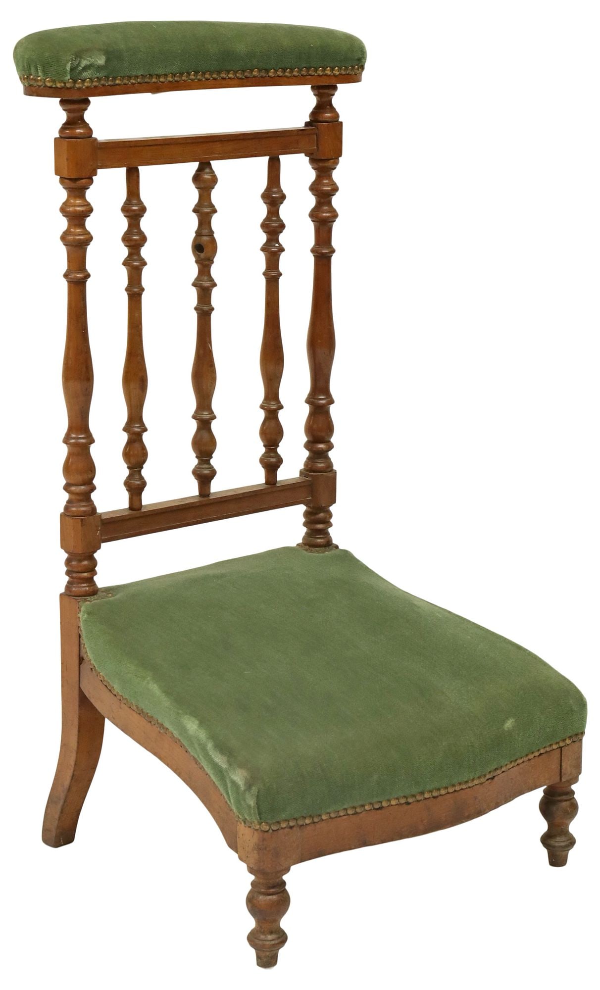 FRENCH NAPOLEON III PERIOD PRAYER KNEELER / PRIE-DIEU: French Napoleon III carved walnut prie dieu/ prayer kneeler, late 19th c., having padded seat and top rail in green fabric upholstery, with nailhead trim, spindled back, rising on turned supports, app