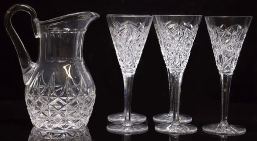 (6) BACCARAT 'LAGNY' CUT CRYSTAL CHAMPAGNE FLUTES & ST. LOUIS PITCHER