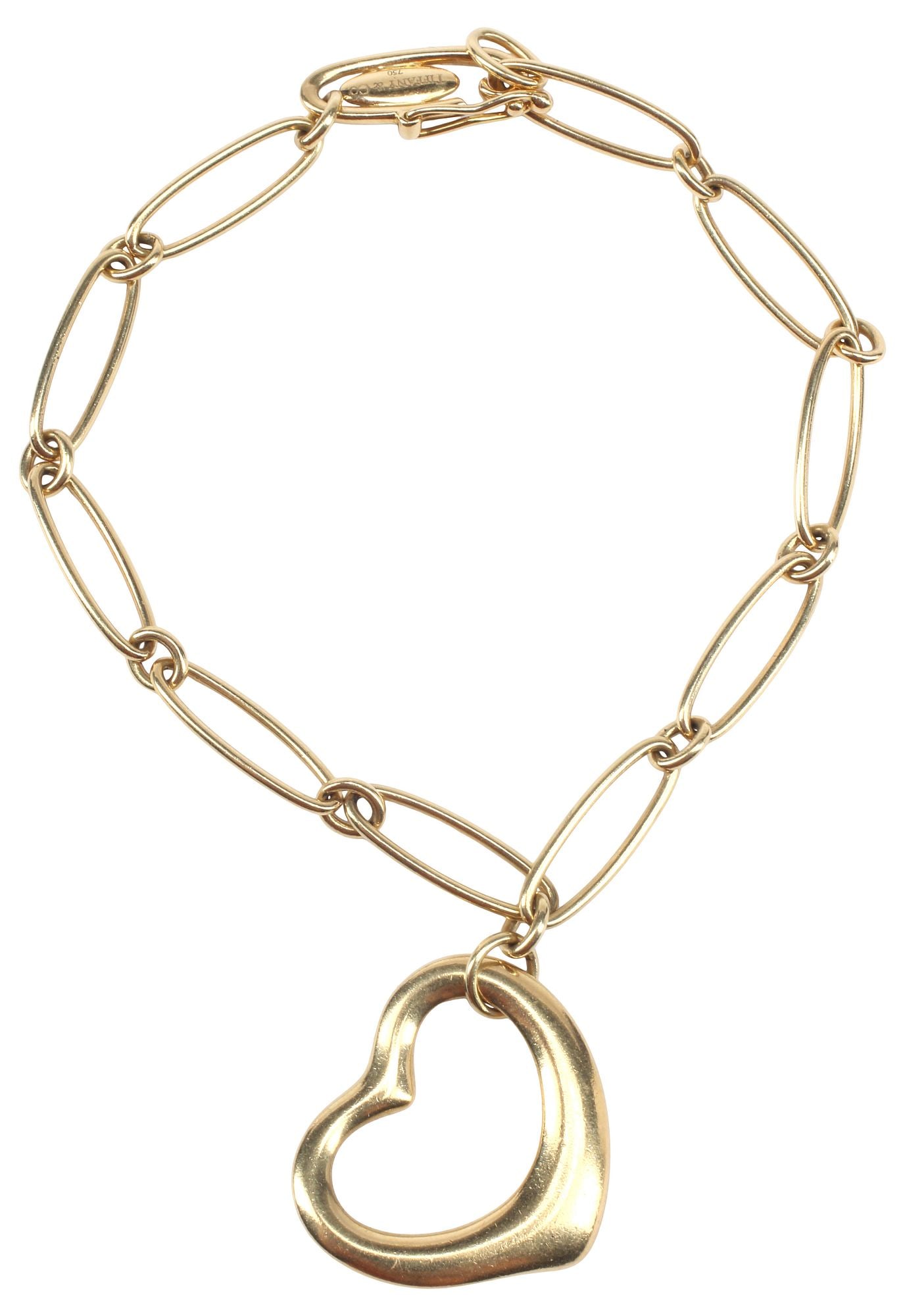 ESATATE ELSA PERETTI FOR TIFFANY & CO. 'OPEN HEART' LINK BRACELET: Estate 18kt yellow gold bracelet, "Open Heart," designed by Elsa Peretti (Italian, 1940-2021) for Tiffany & Company, the bracelet comprised of elongated oval links, hung with an oversize hollow heart,