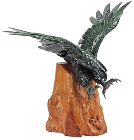 CARVED GREEN HARDSTONE HUNTING EAGLE FIGURE ON WOOD STAND, 27"H