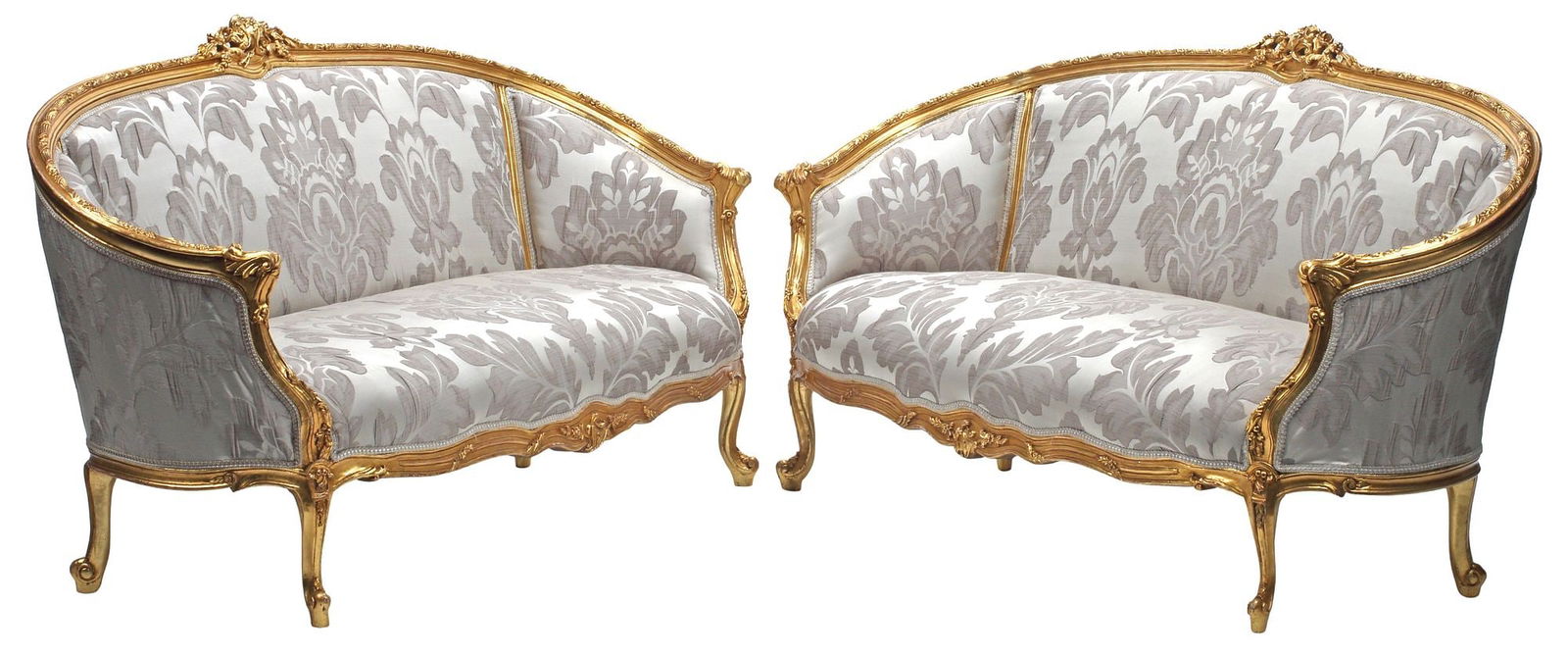 (2) LOUIS XV STYLE UPHOLSTERED GILTWOOD SALON SETTEES: (pair) Louis XV style giltwood salon settees, each having scrolled floral crest, over rounded back and seat in foliate-patterned upholstery, rising on cabriole legs, ending on whorl feet, approx 38"h,