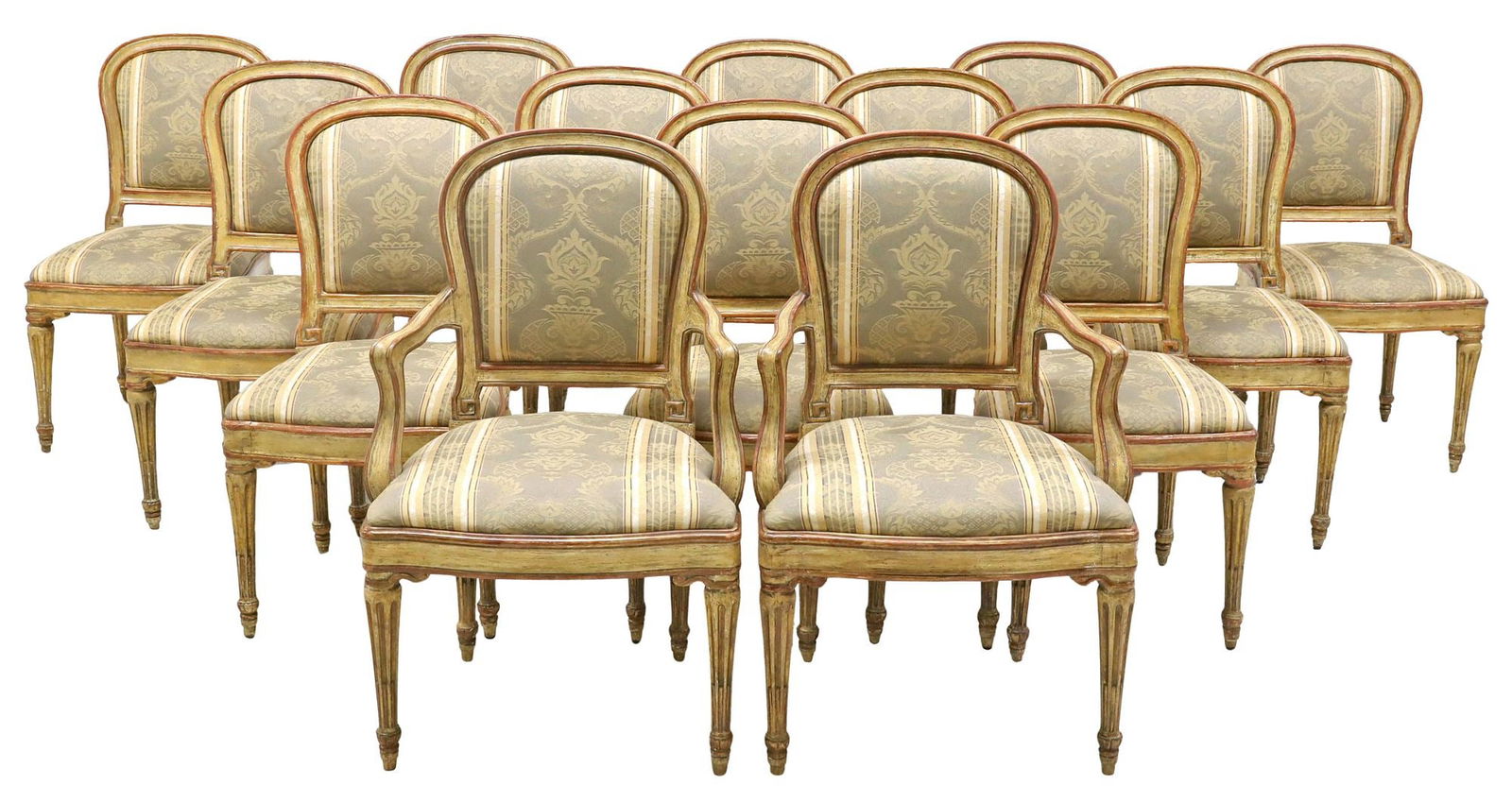 (14) LOUIS XVI PERIOD PAINTED & UPHOLSTERED DINING CHAIRS: (lot of 14) Louis XVI period paint-decorated dining chairs, 18th c., each having rounded back and seat, in patterned fabric upholstery, rising on fluted tapering legs, ending on arrow feet, retaining