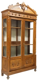 ITALIAN RENAISSANCE REVIVAL CARVED WALNUT BOOKCASE