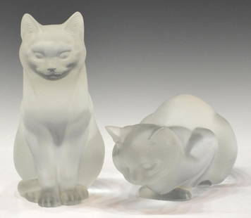 LALIQUE FRANCE CRYSTAL SEATED & CROUCHING CATS: (pair) Large Lalique frosted crystal cat figures: (1) seated figure, 8.25"h; (1) crouching cat, 9"l; both signed underfoot as pictured, 16lbs total Start Price: $400.00