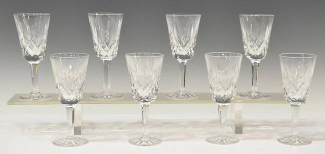 (8) WATERFORD CUT CRYSTAL 'LISMORE' SHERRY GLASSES: (lot of 8) Waterford cut crystal sherry glasses, in the 'Lismore' pattern, one with very minor rim roughness, approx. 5"h, 2.75lbs total Start Price: $80.00