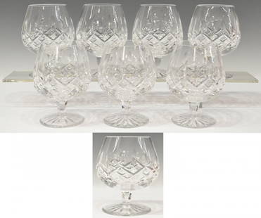 (8) WATERFORD CUT CRYSTAL 'LISMORE' BRANDY GLASSES: (set of 8) Waterford cut crystal brandy glasses in the 'Lismore' pattern, one with minor chip to rim (shown in separate photo), 5.25"h, 7.5lbs total Start Price: $100.00