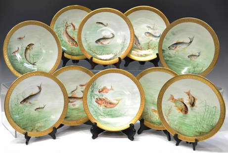 (10) JEAN POUYAT LIMOGES FRANCE GILDED FISH PLATES: (set of 10) Collection of Jean Pouyat Limoges cabinet plates, each hand painted with various fish, floral gilt rim, marked J.P. L. France verso, 8.5"diam., 7.5lbs total Start Price: $150.00