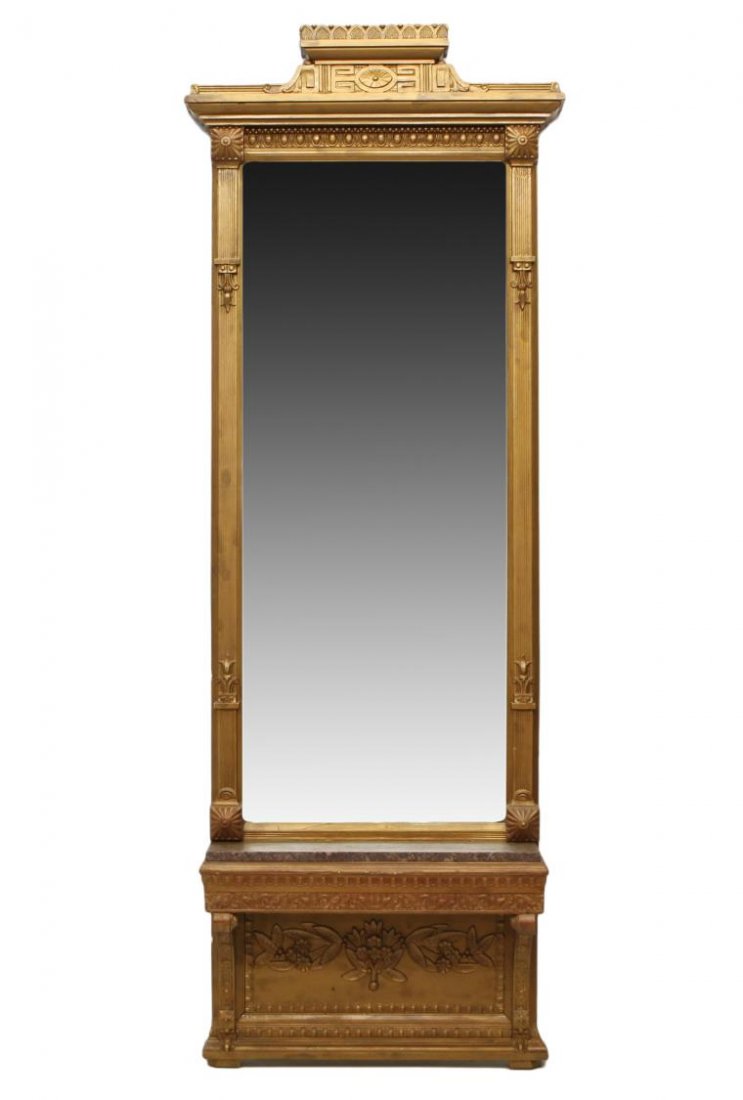 AMERICAN VICTORIAN PIER MIRROR: American Victorian pier mirror, c. 1880, the painted gilt finish with a carved crest over the long central mirror flanked in part by floral topped pilasters, a lower table with repaired marble, 93.5"h
