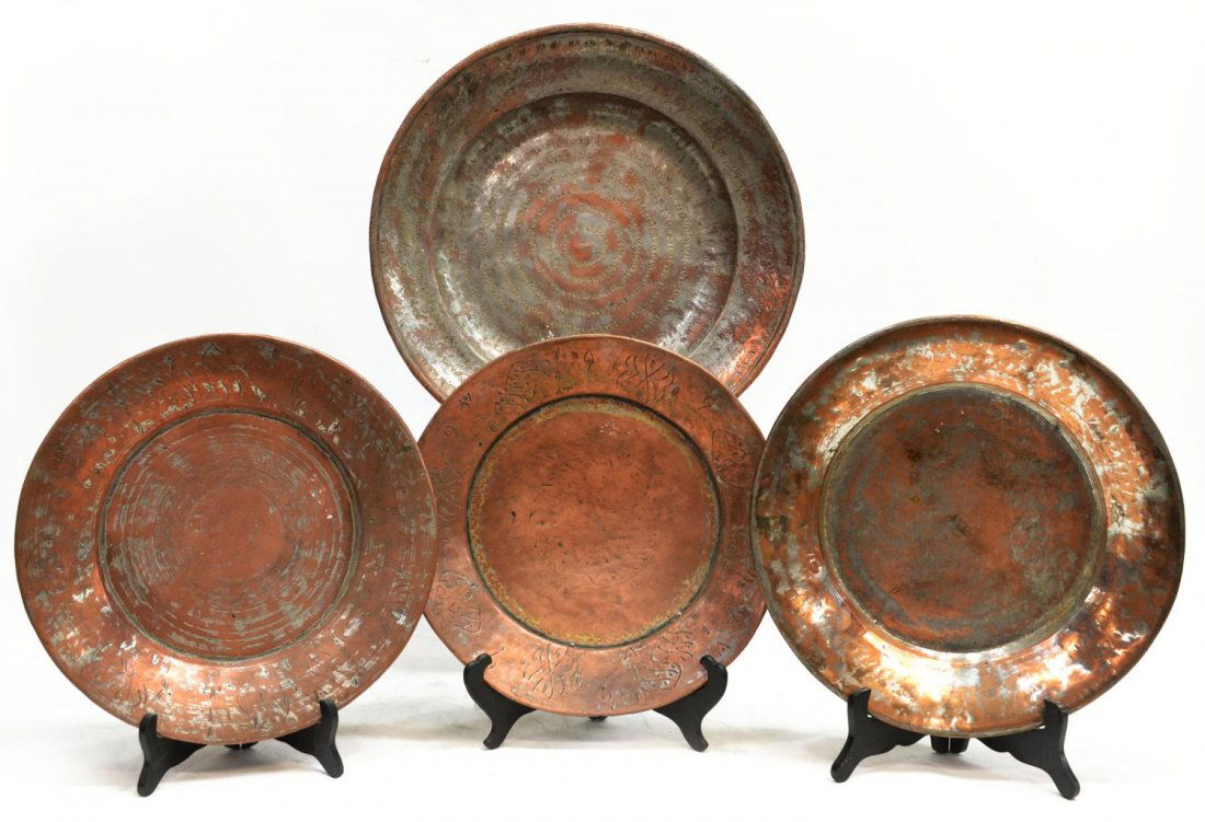 (4) GROUP TURKISH COPPER CHARGERS: (lot of 4) Collection of antique copper chargers, some incised with abstract designs, some wear and denting overall with age, largest: 17.25"diam, 10.75lbs total Start Price: $50.00