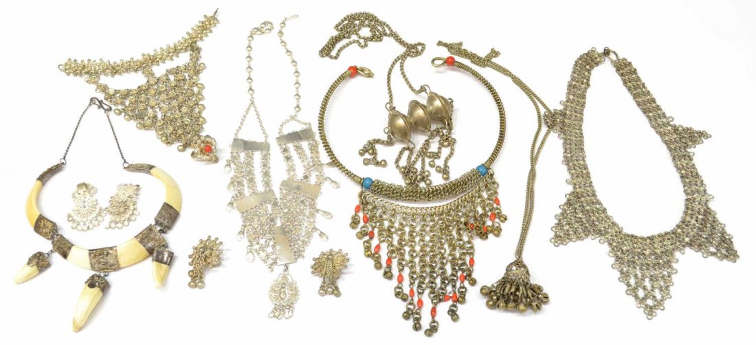 VINTAGE ASIAN & MIDDLE EASTERN JEWELRY COLLECTION: (lot of 11) Collection of vintage silver, 800 silver and white metal jewelry, Middle Eastern and Asian origin, examples include mesh necklaces with varied designs, India ring bracelet, clip earrings, 