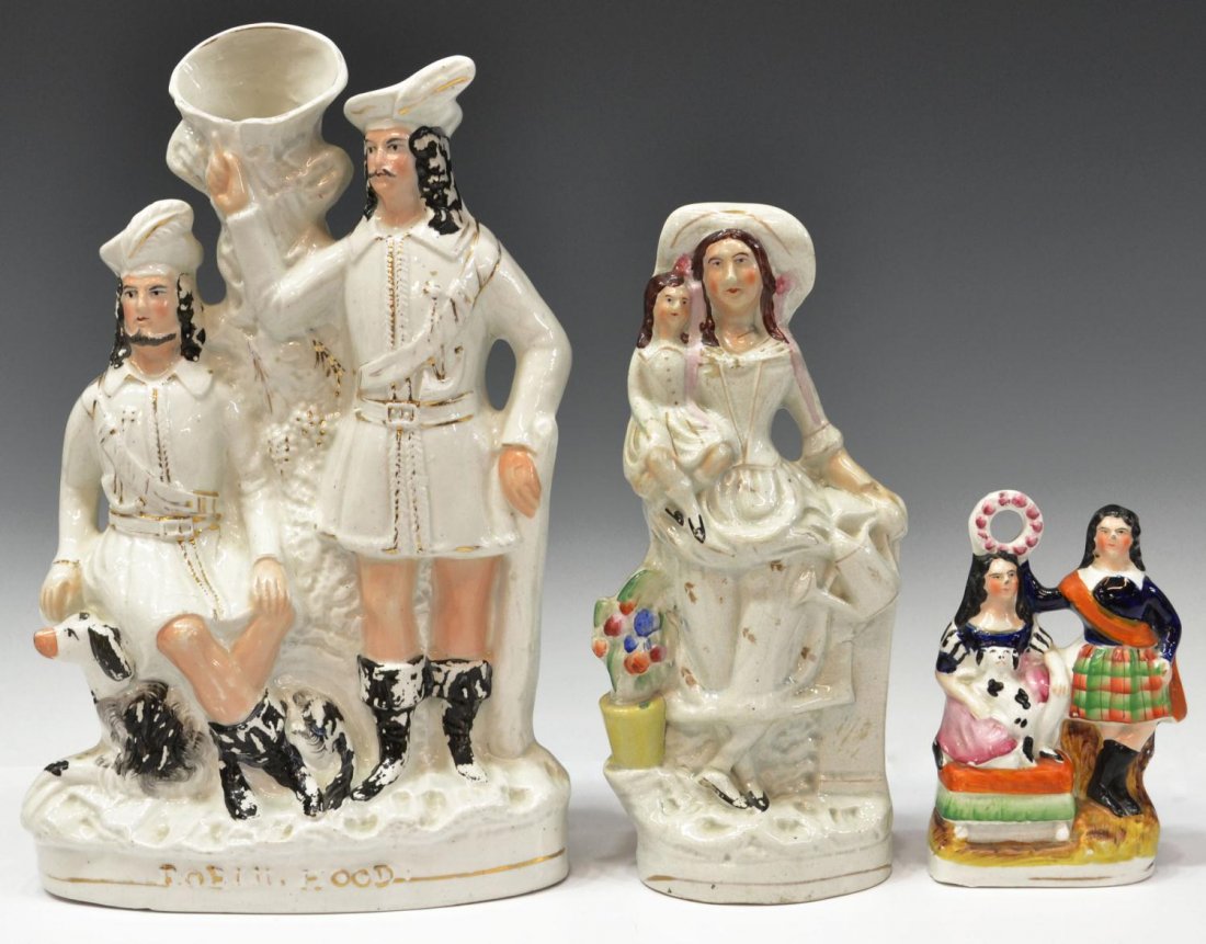 (3) STAFFORDSHIRE PORCELAIN SPILL VASES & FIGURES: (lot of 3) Collection of Staffordshire porcelain, 19th c., comprising: (1) Large figural spill vase, modeled as Robin Hood seated next to a dog and Little John, the title "Robin Hood" in relief at the