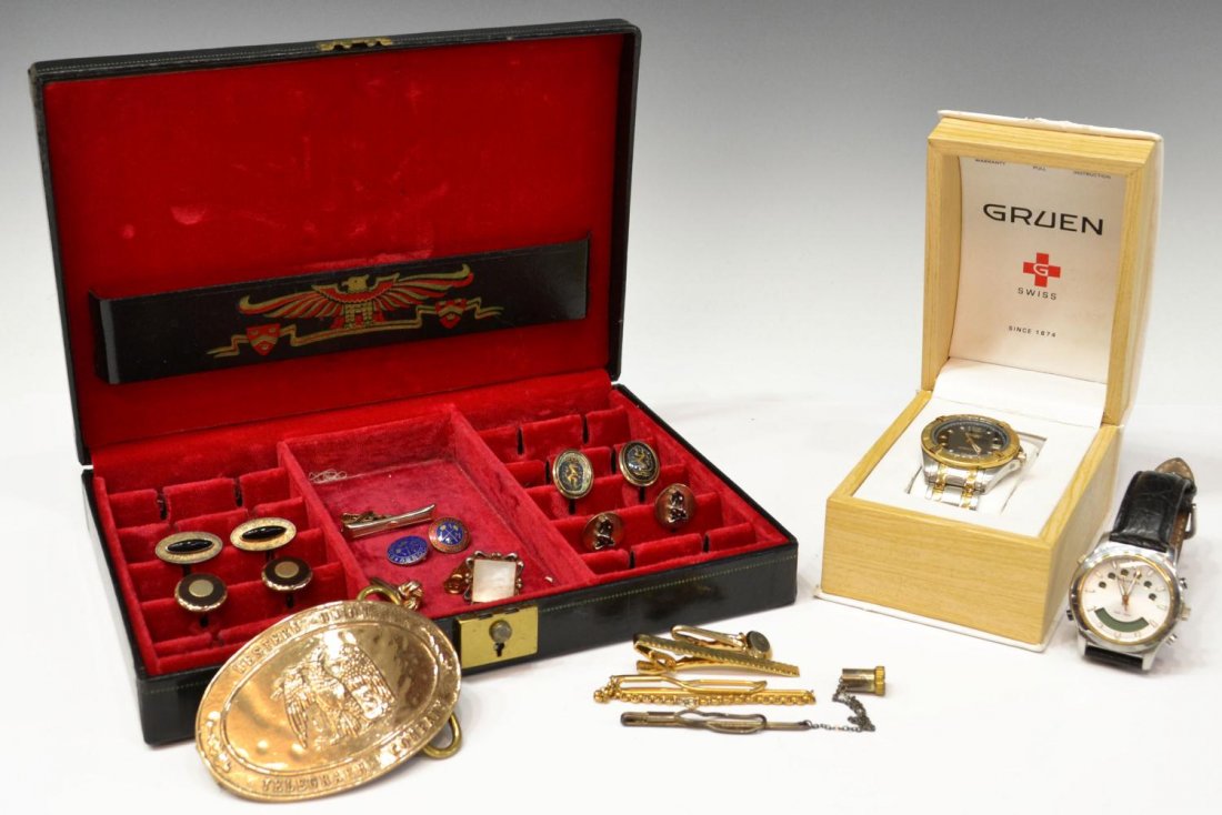 GENTS WATCHES, CUFF LINKS, TIE BARS, LEATHER BOX: Collection of gent's accessories comprising (1) Gruen Swiss watch, retaining original box, (1) Almeda multi-alarm vibrating watch with leather strap, assorted cufflinks, tie bars, parts and pieces in