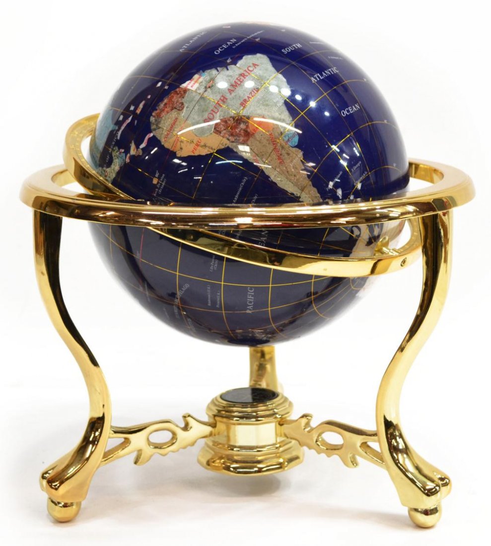 GEMSTONE INLAID TABLE TOP GLOBE ON STAND: Gemstone inlaid table top globe, the continents inlayed with various gems including, mother-of-pearl, turquoise, quartz, marble and other semi-precious stones, set in a gilt metal frame, tripod legs j
