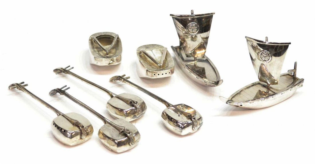STERLING SILVER SALTS: SAIL BOATS, INSTRUMENTS: (lot of 8) Collection of 950 sterling silver salt and pepper shakers, comprising: (2) in the form of sail boats, 2.5"h, 3.75"w; (2) sandals, 1"h, 2"w; (4) formed as Asian stringed instrument, one with