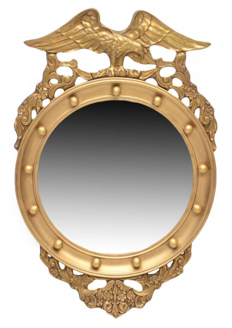 FEDERAL STYLE EAGLE GILTWOOD WALL MIRROR: Federal style foliate and floral carved and pierced giltwood mirror, the circular frame surrounded by a border with roundels, surmounted by a large eagle, convex mirror, some silver loss, wood loss at