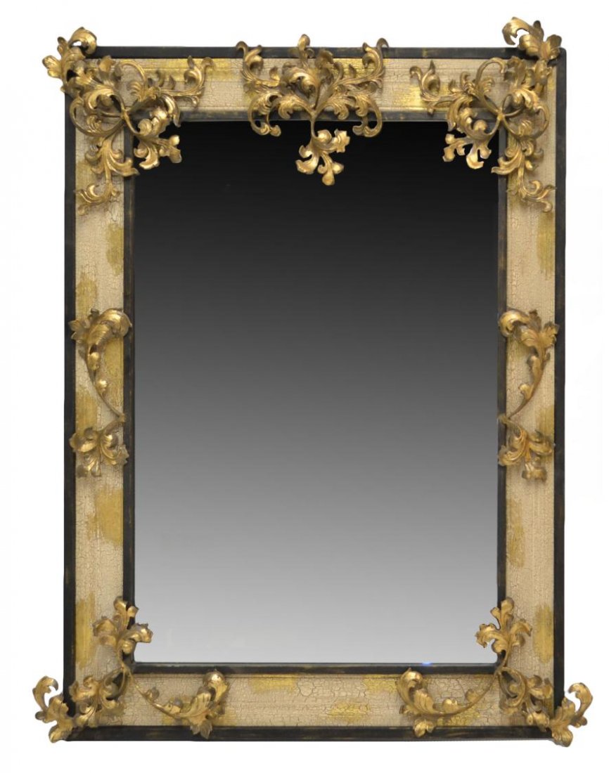 JOHN RICHARD BEVELED GILDED WALL MIRROR, 59.5"H: Large John Richard beveled mirror, the frame with applied scrolled foliage and gilt decoration in an antiqued painted wood and metal frame, mirror: 46"h, 33.75"w, overall: 59.5"h, 48.5"w, 107lbs Start
